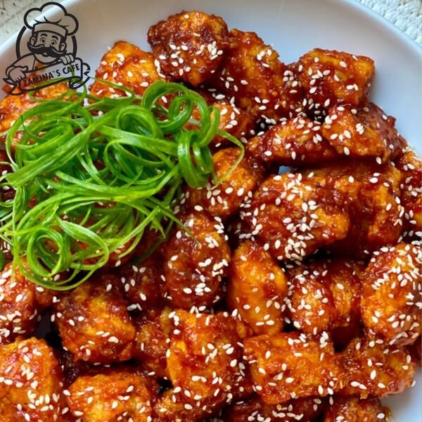 Savor our Korean Bites, a spicy asian food delight with flavorful bite-sized pieces perfect for snacking or sharing.