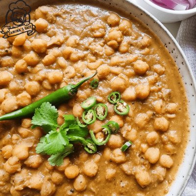 Enjoy our Lahori Chanay, a flavorful asian vegetarian meal featuring spiced chickpeas cooked to perfection. Order Online!