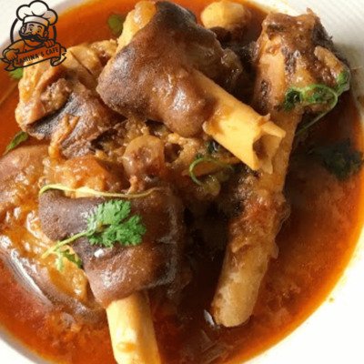 Indulge in our Lamb Paye, an authentic asian food with tender lamb cooked in a rich, flavorful broth, perfect for a hearty meal.