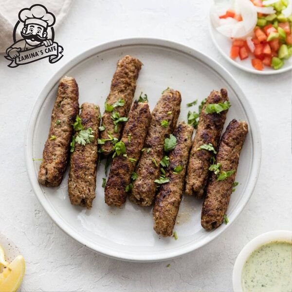 Savor our Meat Kebab, a flavorful asian halal food option, featuring marinated meat grilled to tender perfection.