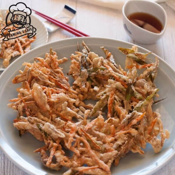 Savor our Mix Vegetable Tempura, a light and crispy asian vegetarian meal with assorted vegetables in a tempura batter.