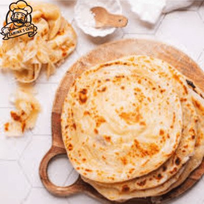 Savor our Paratha, a traditional asian food with layers of flaky, buttery bread, perfect as a side or on its own. Order Online!