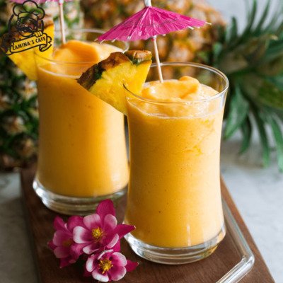 Savor our Tropical Smoothie, a refreshing asian drink made with a blend of tropical fruits, perfect for a cool treat.