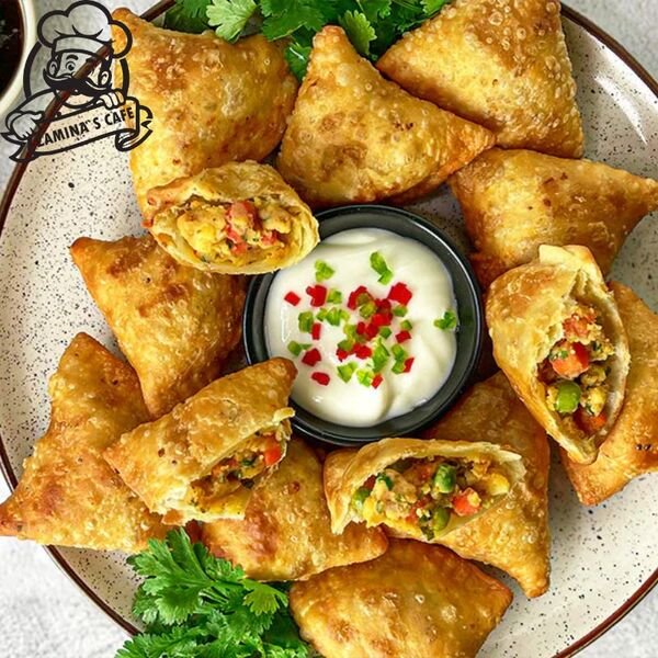 Relish our Veg Samosa, a delicious asian vegetarian meal with a crispy crust and spiced vegetable filling. Order Online!