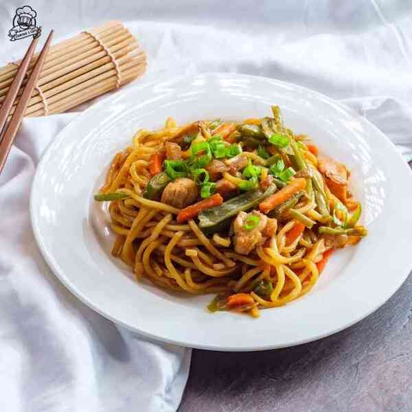 Enjoy our Veg Yakisoba, a delicious japanese vegetarian food option featuring stir-fried noodles and fresh vegetables.