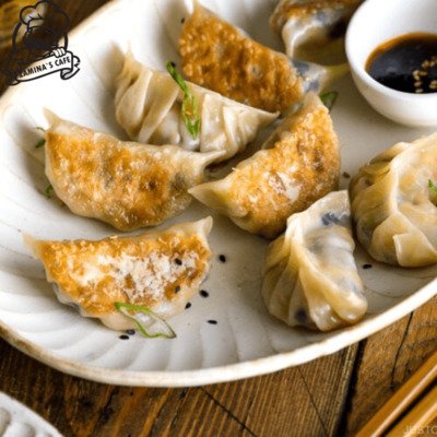 Enjoy our Vegetable Gayoza, a tasty asian vegetarian meal featuring dumplings filled with fresh vegetables.